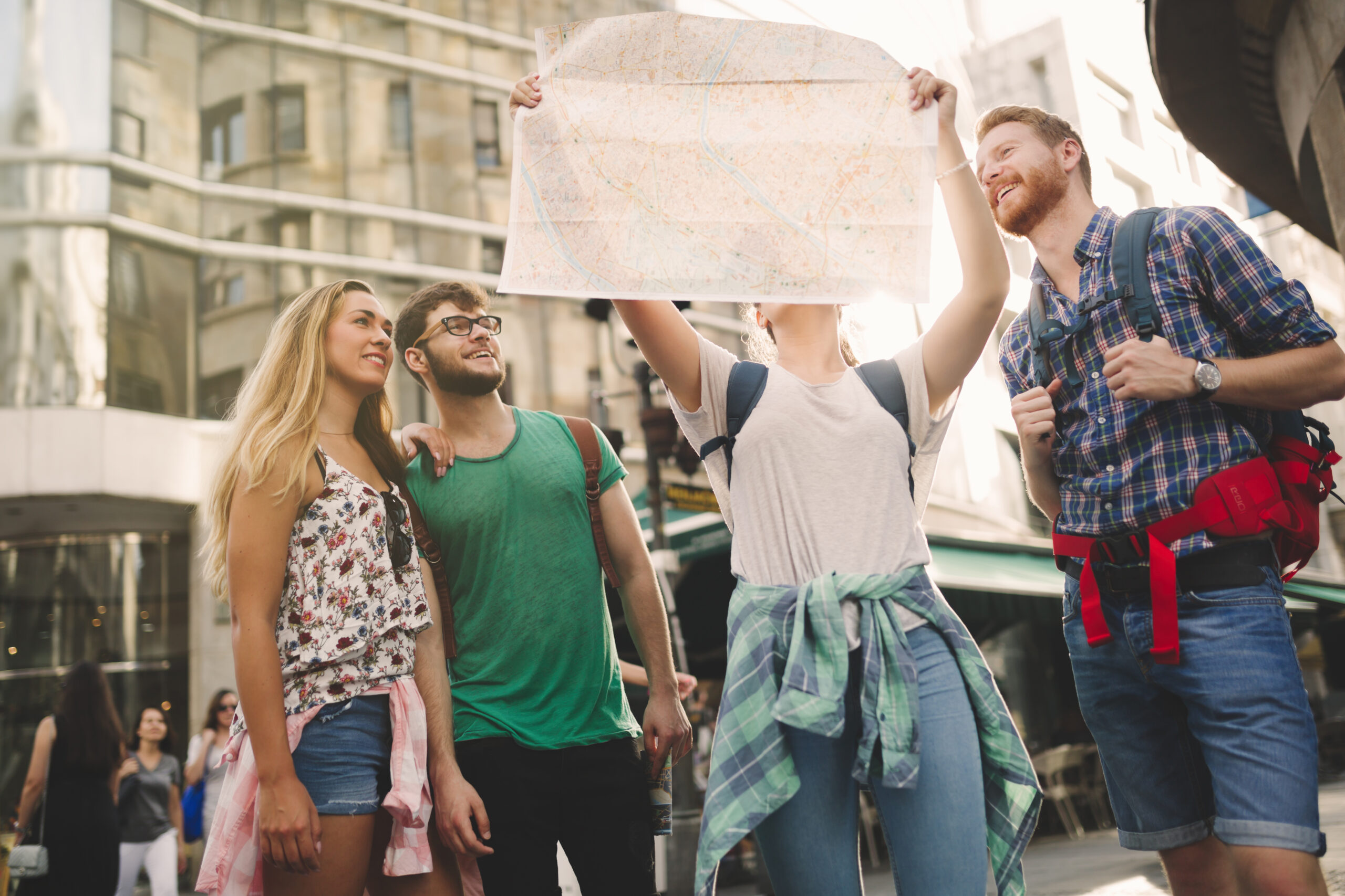 Tourist group led by tour guide on their travel